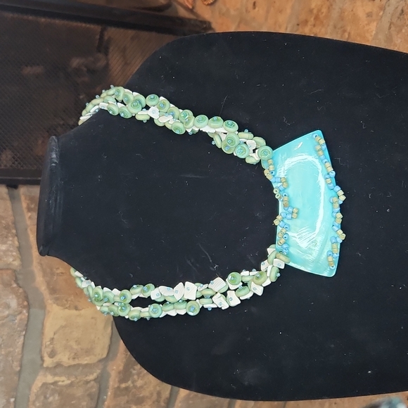 BEACHY DOUBLE STRANDED NWCKLACE FEATURING TURQUOISE COLORED BEADS AND SHELLS - Picture 3 of 4